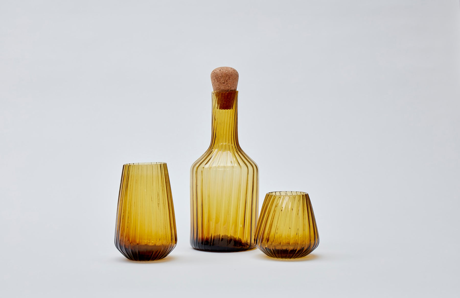 Hand-blown recycled glass short tumbler in amber